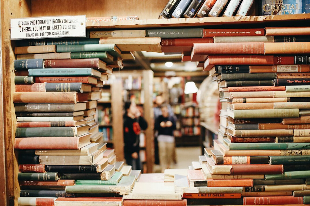 person reading mystery book
