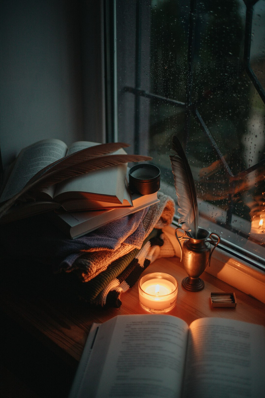 rainy window with book